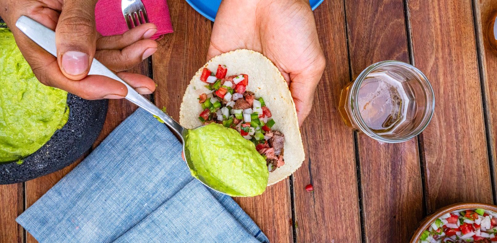 Taco topped with salsa verde de aguacate