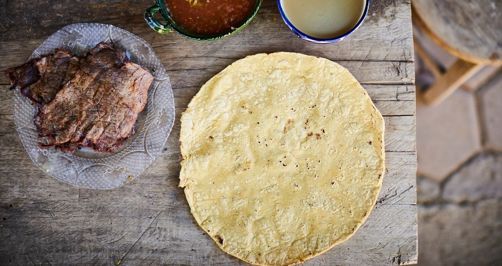 Tlayuda tortilla with a side of steak