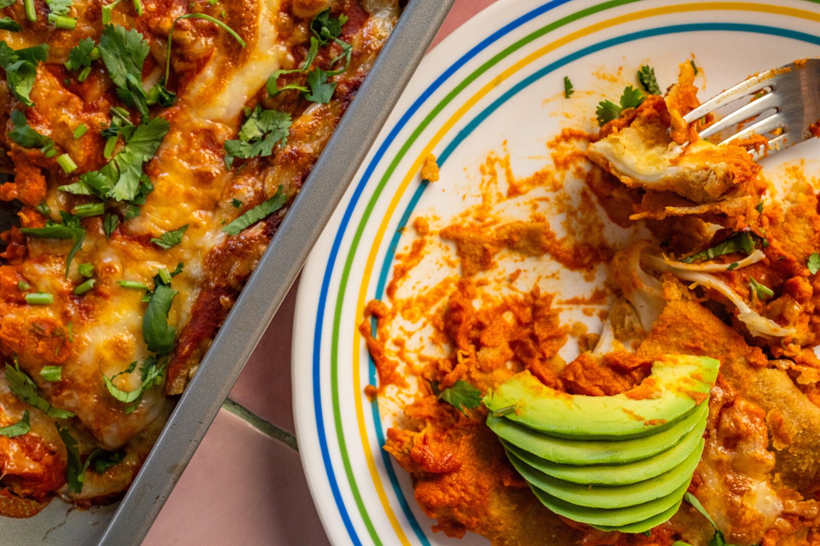 Butternut squash enchiladas topped with avocado