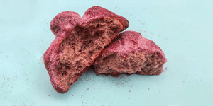 Sliced hibiscus pan de muerto made of corn