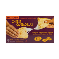 Masienda Cheese Quesadillas packaging with hands holding quesadillas