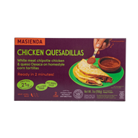 Masienda Chicken Quesadillas packaging with a hand spooning sauce onto quesadillas